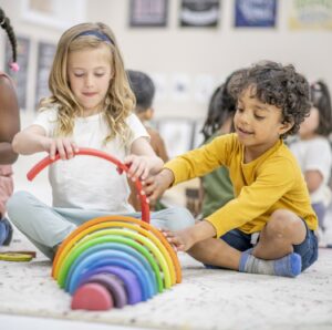 Two children working on social skills together